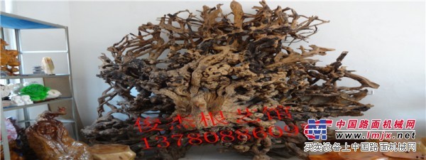 俊杰根艺馆为您提供卓越的批发根雕茶桌 服务   批发根雕实木的